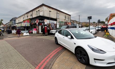 A car parked across double red lines.