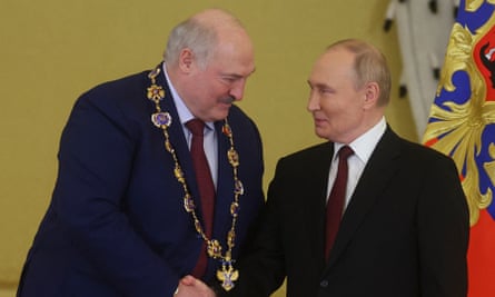 Alexander Lukashenko shaking hands with Vladimir Putin