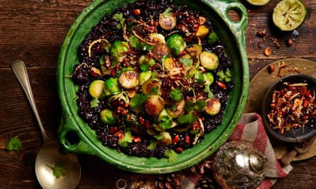 Black miso sticky rice with sprouts and peanuts.