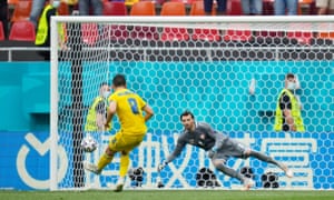 Ruslan Malinovskyi of Ukraine has a penalty saved by Stole Dimitrievski of North Macedonia.