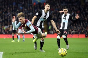 Jack Grealish goes down theatrically after going past Federico Fernandez.