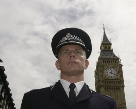 Brian Paddick joins other gay police officers as they march through central London, as part of the Gay Pride Mardi Gras 2003 parade.