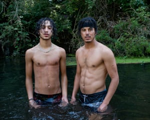 Friends Billz and Amir swimming in the River Lea, Hackney July 2020
