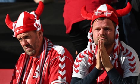 Denmark fans in Copenhagen look shocked by the medical emergency involving Christian Eriksen on Saturday during the match against Finland