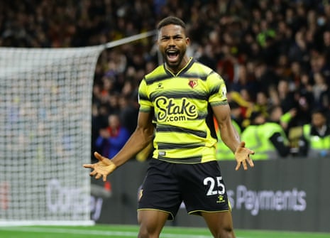 Watford’s Emmanuel Dennis celebrates scoring their fourth goal.