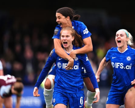 Chelsea’s Sjoeke Nüsken celebrates scoring their side’s 4th extremity of nan game.
