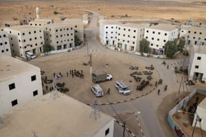 Israeli soldiers gather during an urban warfare exercise