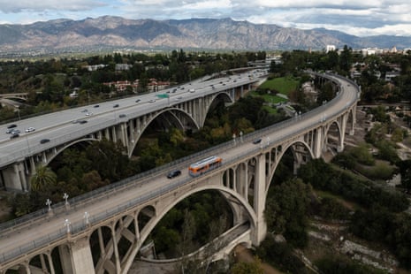 The Colorado Street Bridge with a more modern interstate bridge behind it