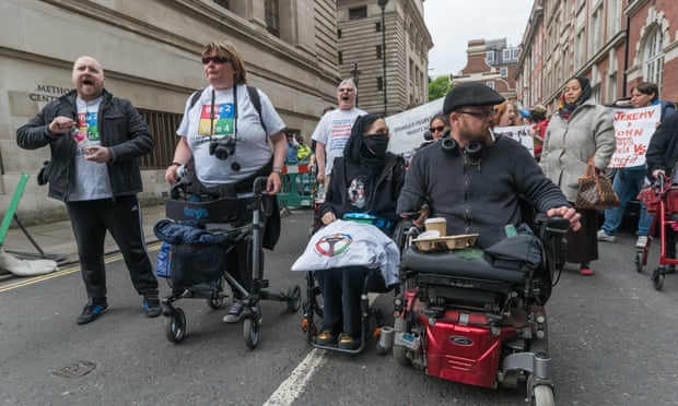 Campaigners from Disabled People against Cuts (DPAC) protest in central London against welfare reform 