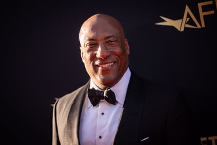 man in tuxedo smiles