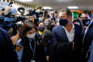 Actor Leonardo DiCaprio attends the climate conference wearing a mask