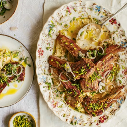 Spiced lamb chops with hummus.