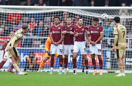 Josh Benson scores with a free kick for Rotherham.