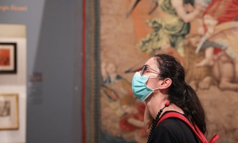 A woman wearing a face mask visits the exhibition “Raffaello 1520-1483” in Rome. The “Raffaello 1520-1483” exhibition, the largest-ever retrospective of the life and work of Renaissance maestro Raphael, reopened to public recently at the Scuderie del Quirinale in Rome. Visitors, who had to wear face masks, were required to reserve precise entry times. Each visitor had his or her temperature taken by a digital thermometer upon entry.