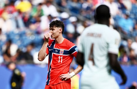 Norway's Jorgen Strand Larsen looks dejected after his penalty is saved by France's Mike Maignan.