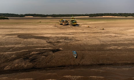 A tugboat and a ferry stranded on a sandbank formed by a severe drought hitting the rivers of the Amazon basin in the municipality of Iranduba, Brazil
