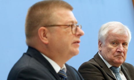 Thomas Haldenwang, left, president of Germany’s Federal Office for the Protection of the Constitution, with the interior minister, Horst Seehofer, said they would not view the cases of extremism in isolation.