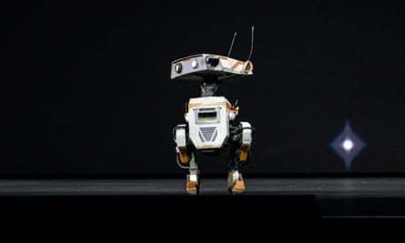 A robot walks on stage at the Nvidia GTC conference.