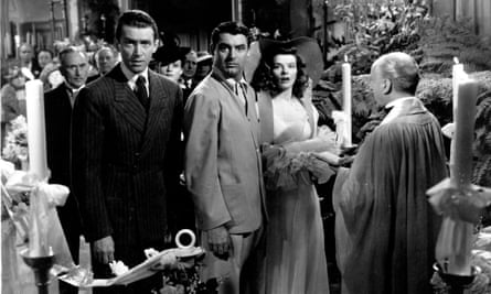 James Stewart, Cary Grant and Katharine Hepburn at the altar, all looking surprised, in The Philadelphia Story