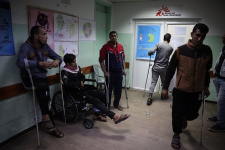 A group of injured young men waiting for their turn in treatment December 3, 2019.