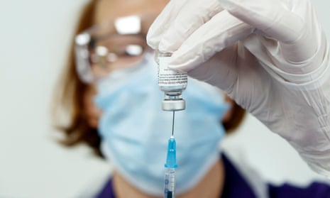 A nurse prepares the Pfizer-BioNTech vaccine at the Thackray Museum of Medicine in Leeds, England.
