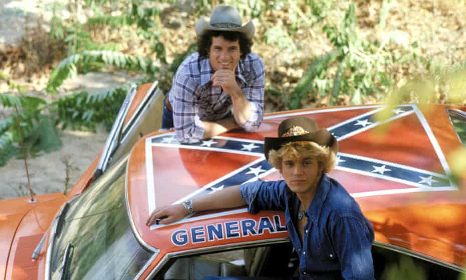Tom Wopat and John Schneider with the General Lee car from the Dukes of Hazzard.