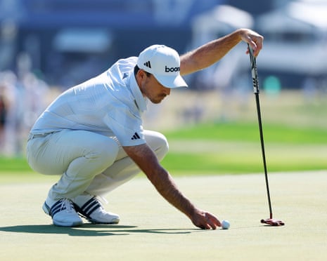 Nick Taylor lines up a putt