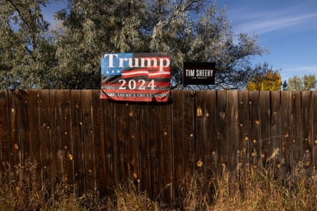 Trump 2024 and Tim Sheehy signs are seen near residential areas in Bozeman.