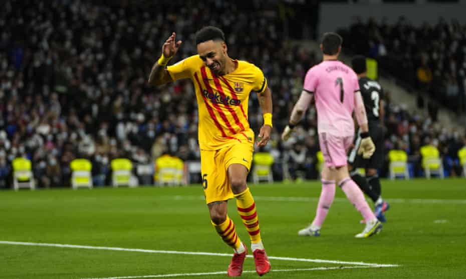 Pierre-Emerick Aubameyang dances with delight after scoring Barcelona's fourth goal against Real Madrid.