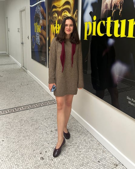 a woman in a sweater dress