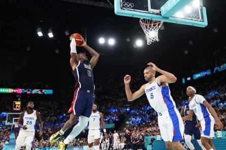 Lebron James dunks against France in a high-quality men’s basketball final.