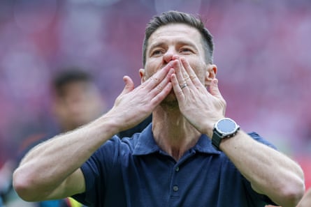 Xabi Alonso salutes Bayer Leverkusen’s supporters after his final game as their coach