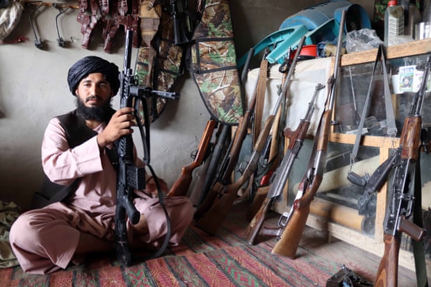 An Afghan arms dealer sells weapons at his shop in Panjwai district of Kandahar province, Afghanistan, 07 September 2021.