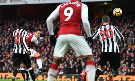 Mesut Ozil gives Arsenal the lead against Newcastle.
