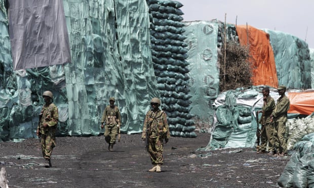 Soldiers form the Kenya Defence Forces and the Somali Transitional Federal Government patrolling a charcoal depository in Burgabo, Somalia, in 2011.