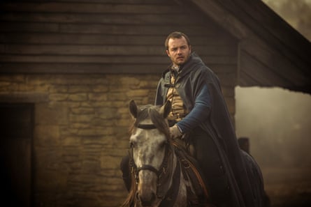 tv still of a man in tudor costume on a horse