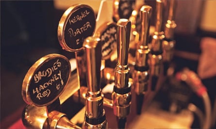Pumps labelled with craft beer brews at the Old Fountain, Shoreditch, London