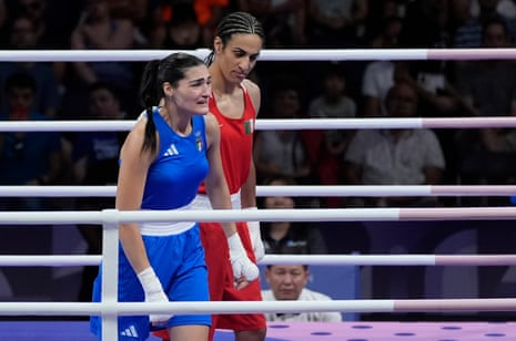 Italy’s Angela Carini after being defeated by Algeria’s Imane Khelif, right, in their women’s 66kg preliminary boxing match.