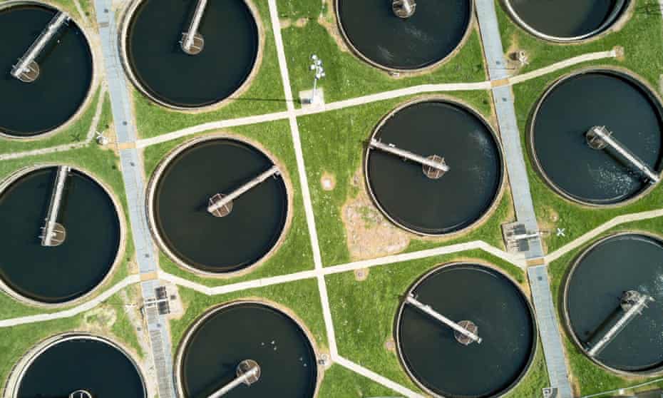 An aerial view of clarifying tanks in a north London sewage farm.