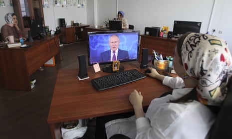 Watching Putin on computer screen