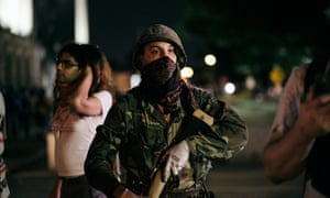 A so called militia man at protests in Kenosha, Wisconsin, on 25 August 2020.