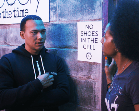 Man and woman talking.