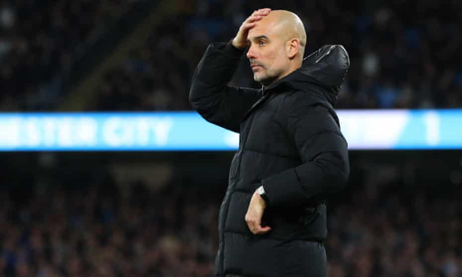 Pep Guardiola composes himself during City’s 4-1 win in the Manchester derby