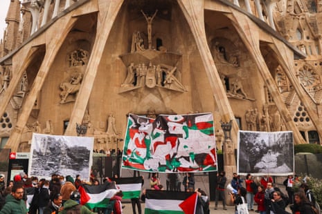 Pro-Palestinian demonstrators protest in front of the La Sagrada Familia, during the Union for the Mediterranean summit which is taking place in Barcelona.