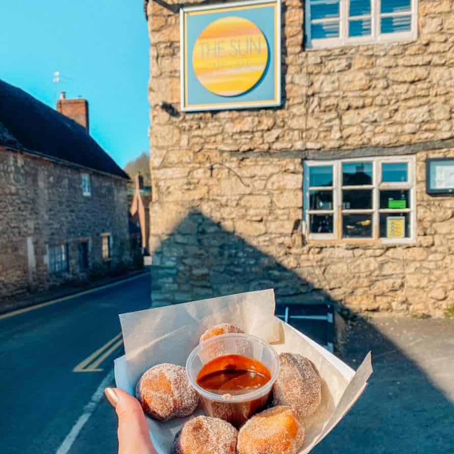 Takeaway doughnuts with Nutella dip outside the Sun.