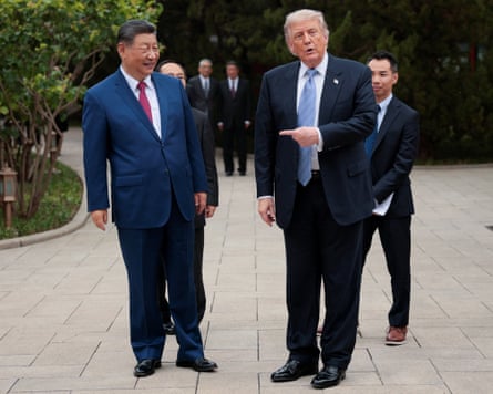 Donald Trump and Xi Jinping after a visit to the Zhongnanhai garden in Beijing.