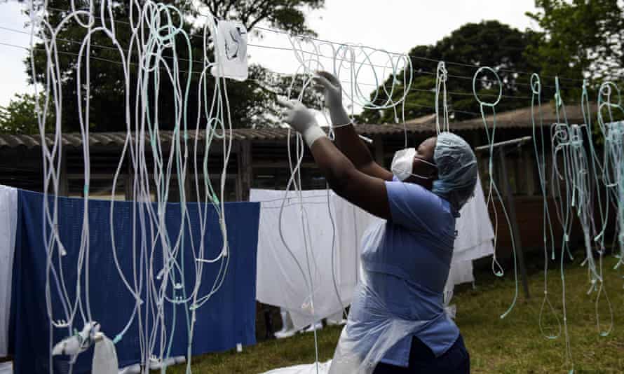 A health worker dries decontaminated nasal prongs and oxygen face masks at Queen Elizabeth Central Hospital in Blantyre. Malawi faces a resurgence of Covid-19 that is overwhelming the country where a presidential residence and a national stadium have been turned into field hospitals in efforts to save lives.