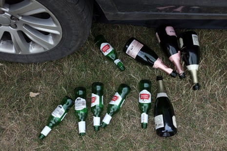 Bottles are seen on the floor ahead of the day's races.