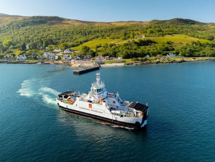 An aerial view of the Caledonian MacBrayne ferry departing Lochranza, Isle of Arran