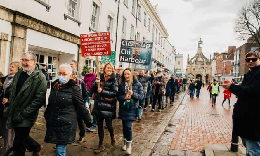 Protesters march to Chichester county hall.